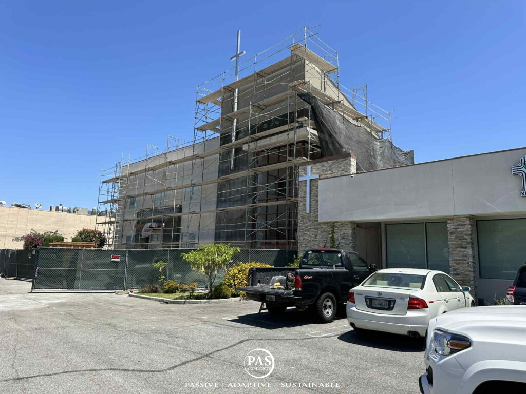 Construction progress of Korean Church of SW LA showing scaffolding on renovated facade by PAS Architects.