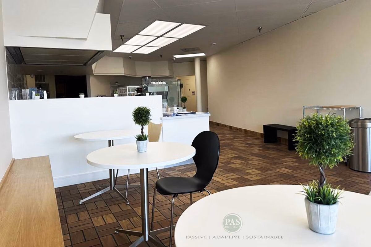 TOT Café seating area after small cafe renovation with updated finishes and ADA-compliant spacing.